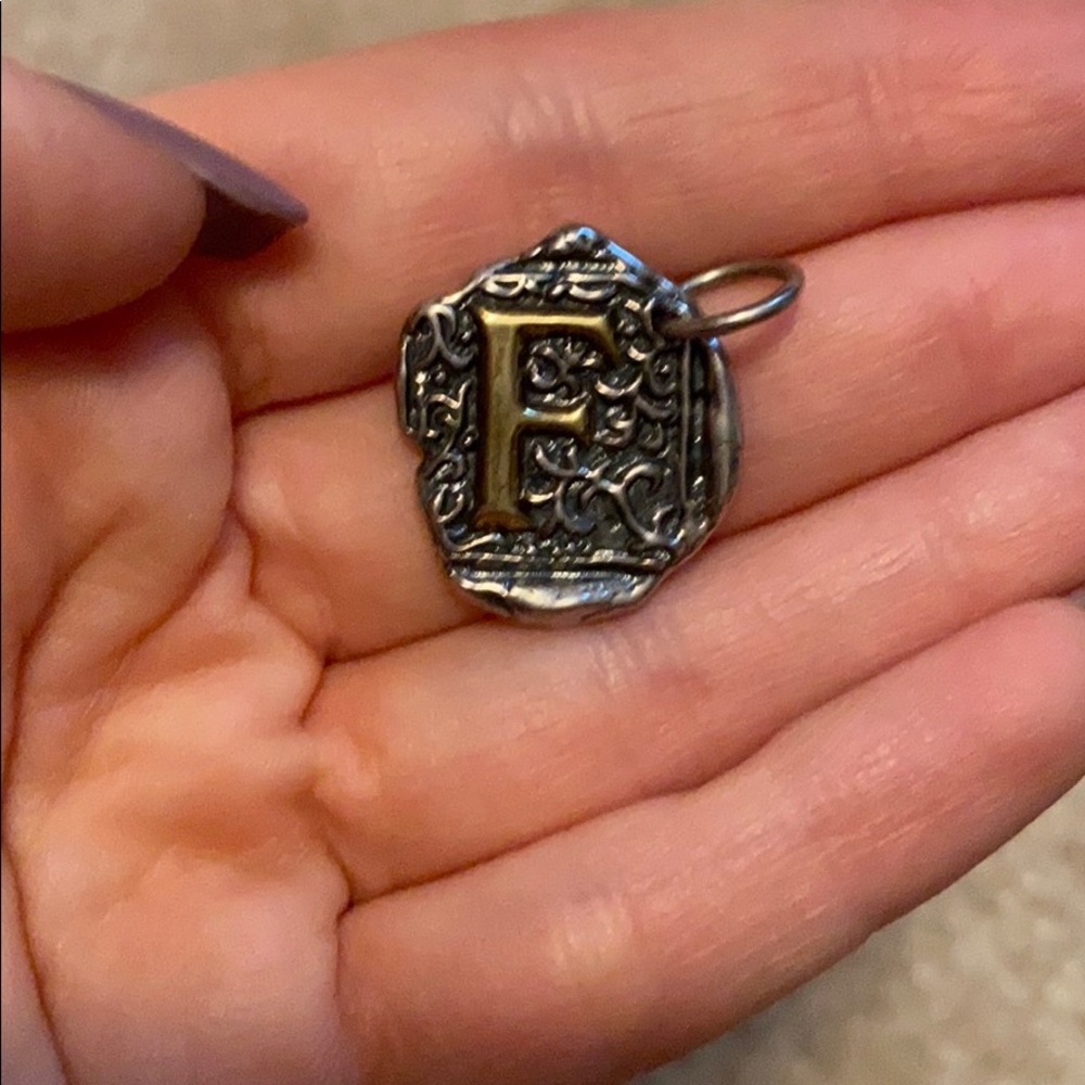 Brass and silver Waxing poetic F charm